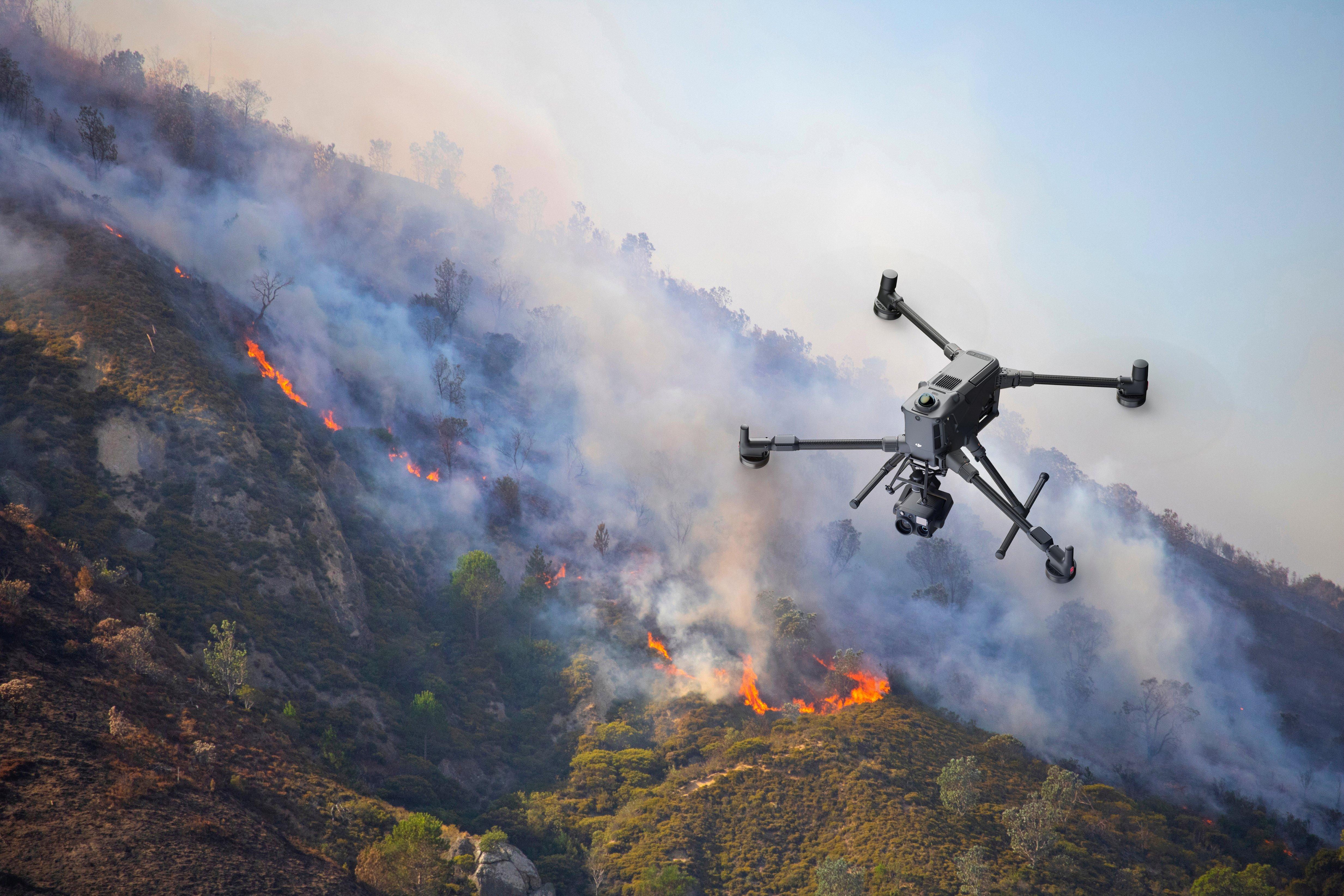 DJI drone hovering over a forest fire